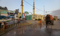 نظافت و شست‌وشوی مسیر راهپیمایی جاماندگان اربعین توسط شهرداری بجنورد